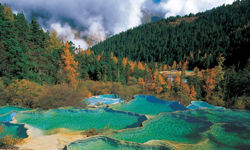14 días Viajes del Patrimonio Mundial de China Área Escénica de Huanglong